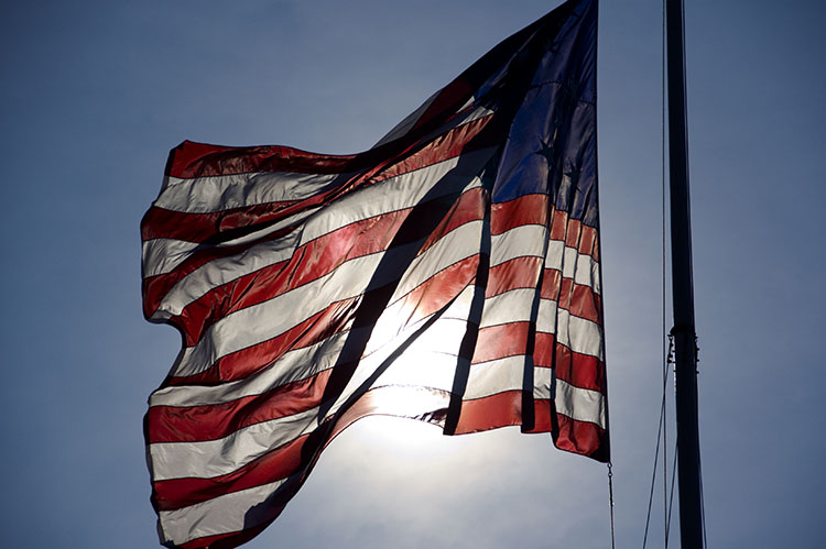 American Flag waving in the sun